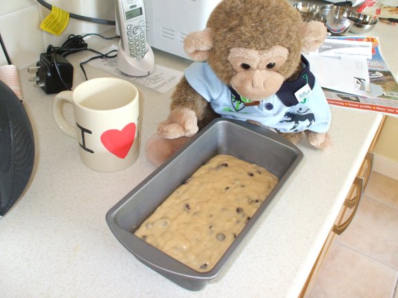 Jimby puts the mixture in the bread tin