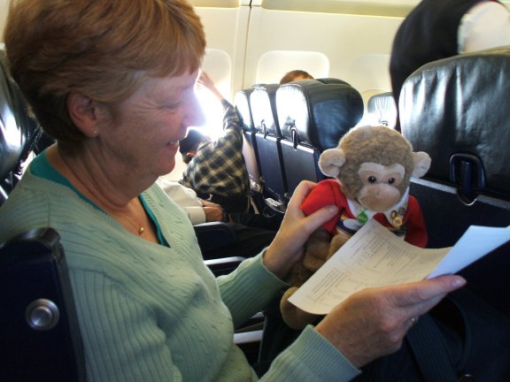 Ann shows me a leaflet about the flight.